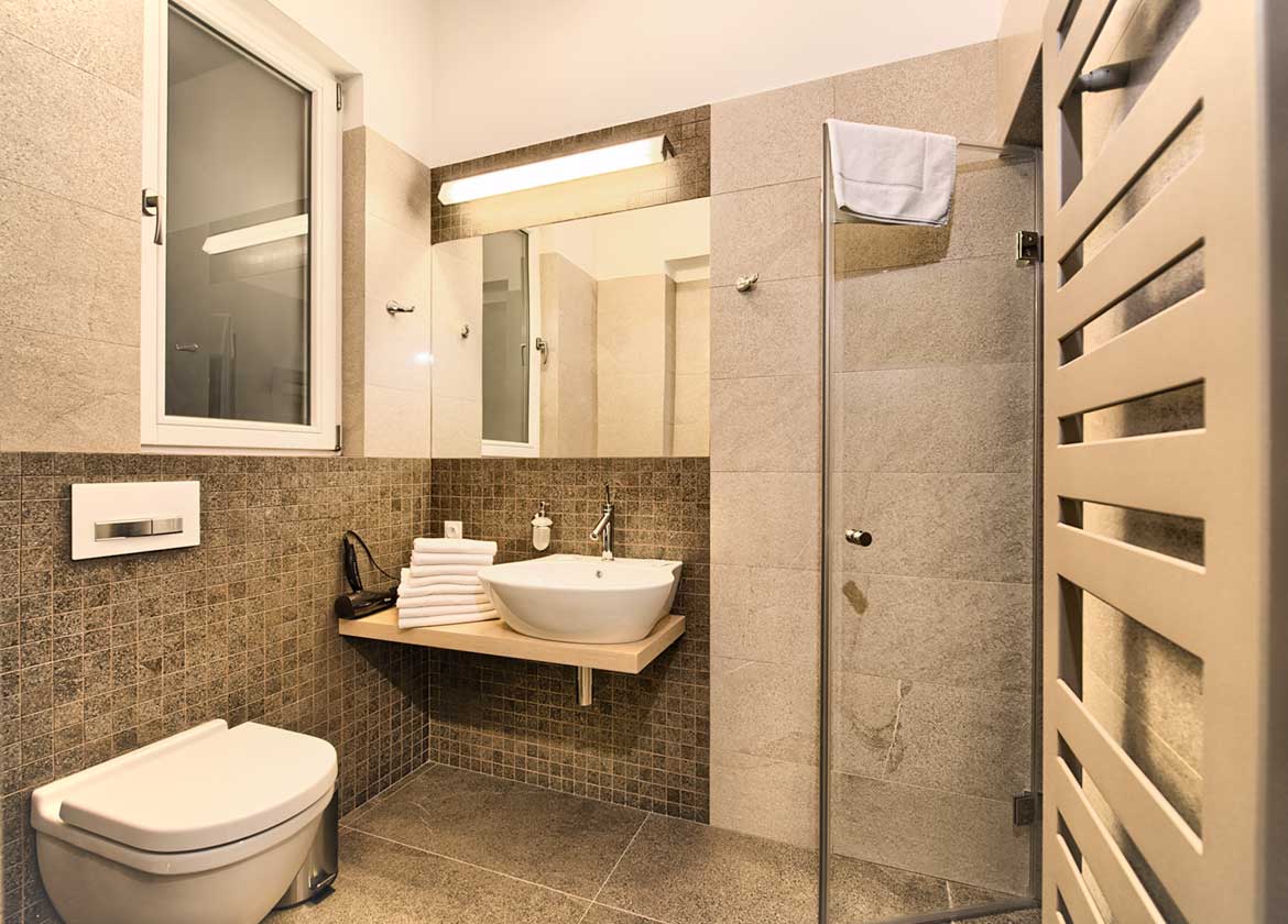 Beautiful bathroom with a steam shower in the Krizovnicka Apartments
